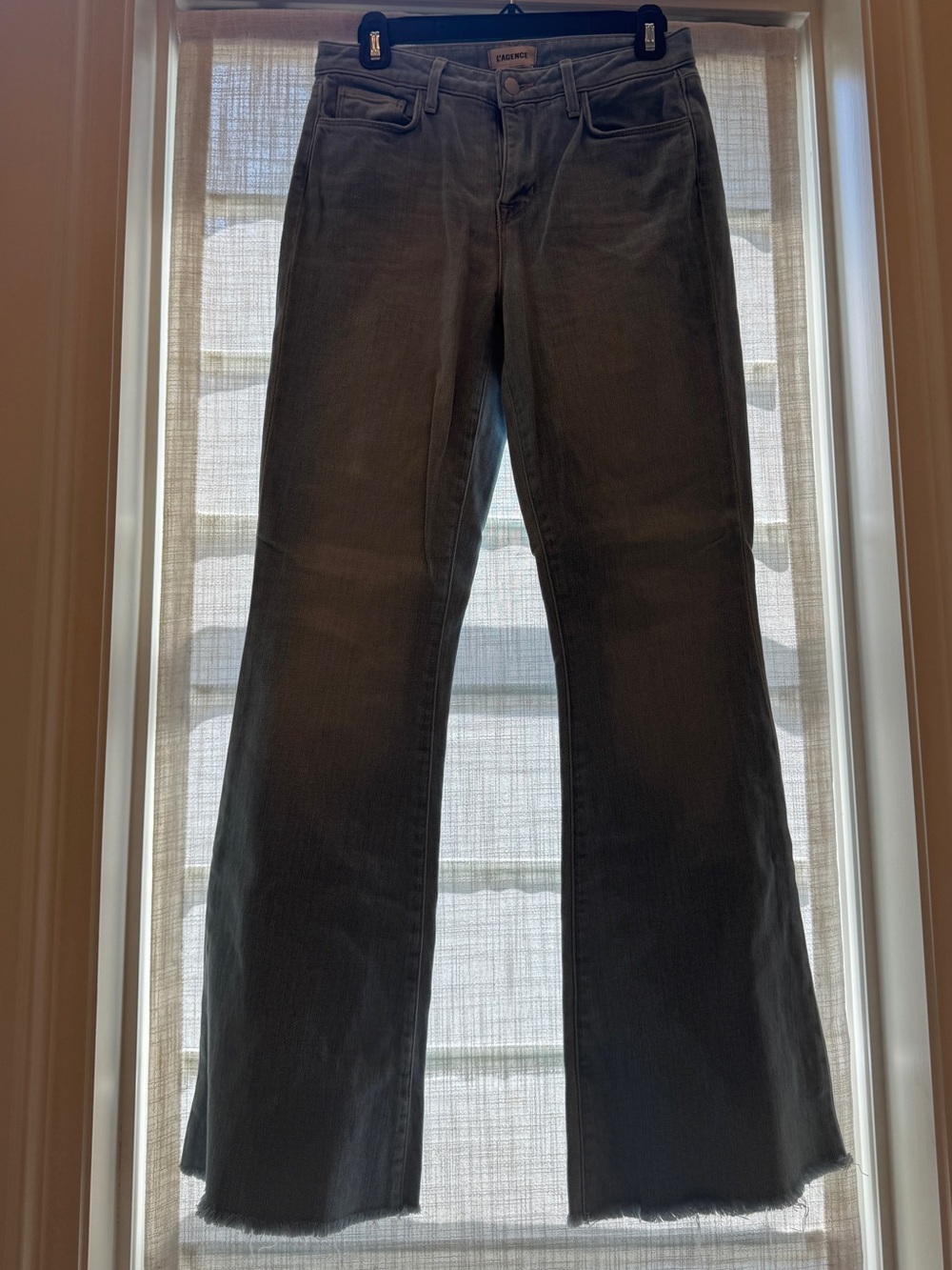 L'AGENCE light-wash denim jeans